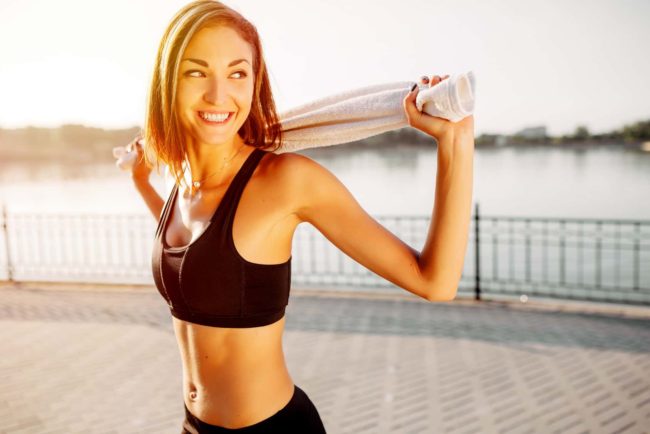 Portrait of an athletic girl. Beautiful young sport fitness mode